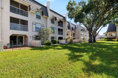 Effortless living starts here! Attractive ground-floor unit on Bayou Golf Club in Florida - for sale on GolfHomes.com, golf home, golf lot