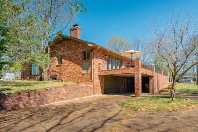 Discover the epitome of beauty and comfort at 819 Fairway in on Lakeshore Country Club in Kentucky - for sale on GolfHomes.com, golf home, golf lot