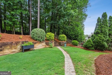 Charming 3-Bedroom Home in Sought-After Towne Lake Hills West - on Towne Lake Hills Golf Club in Georgia - for sale on GolfHomes.com, golf home, golf lot