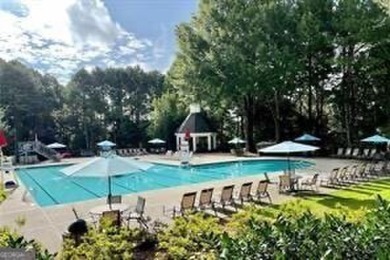 Charming 3-Bedroom Home in Sought-After Towne Lake Hills West - on Towne Lake Hills Golf Club in Georgia - for sale on GolfHomes.com, golf home, golf lot