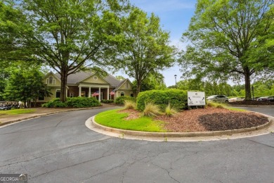 Charming 3-Bedroom Home in Sought-After Towne Lake Hills West - on Towne Lake Hills Golf Club in Georgia - for sale on GolfHomes.com, golf home, golf lot