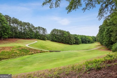 Charming 3-Bedroom Home in Sought-After Towne Lake Hills West - on Towne Lake Hills Golf Club in Georgia - for sale on GolfHomes.com, golf home, golf lot