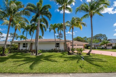 Located in the desirable city of Atlantis, this unique custom on Atlantis Golf Club in Florida - for sale on GolfHomes.com, golf home, golf lot