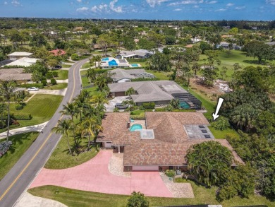 Located in the desirable city of Atlantis, this unique custom on Atlantis Golf Club in Florida - for sale on GolfHomes.com, golf home, golf lot