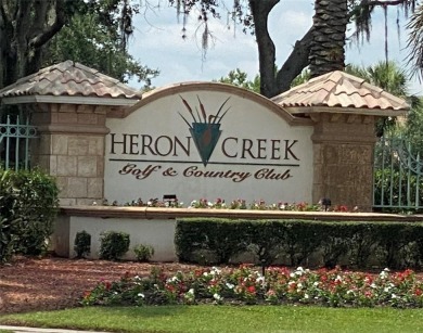 Enjoy the Florida lifestyle in this exquisite 2 bedroom 2 bath + on Heron Creek Golf and Country Club in Florida - for sale on GolfHomes.com, golf home, golf lot