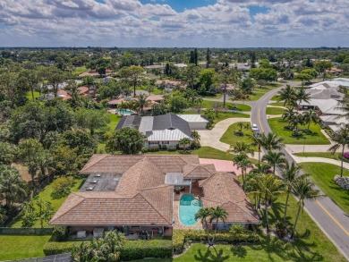 Located in the desirable city of Atlantis, this unique custom on Atlantis Golf Club in Florida - for sale on GolfHomes.com, golf home, golf lot