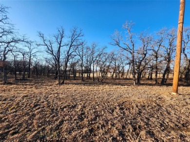 Golfers dream this beautiful .54 acre build site backs up to on Nocona Hills Golf Course in Texas - for sale on GolfHomes.com, golf home, golf lot