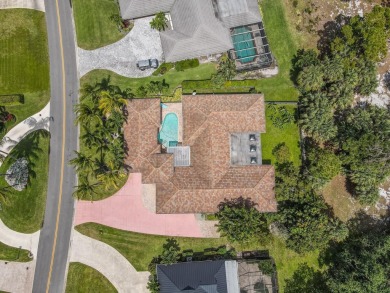 Located in the desirable city of Atlantis, this unique custom on Atlantis Golf Club in Florida - for sale on GolfHomes.com, golf home, golf lot