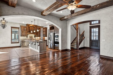 An inviting and warm home situated along one of the neighborhood on Rivercut Golf Course in Missouri - for sale on GolfHomes.com, golf home, golf lot