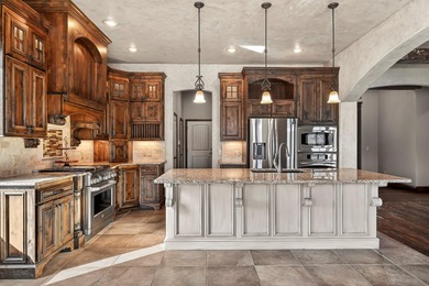 An inviting and warm home situated along one of the neighborhood on Rivercut Golf Course in Missouri - for sale on GolfHomes.com, golf home, golf lot