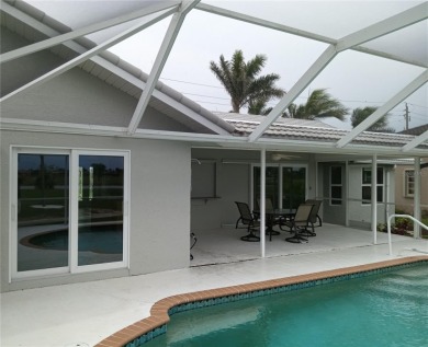 Welcome to this beautifully updated 3-bedroom, 2-bath pool home on Twin Isles Country Club in Florida - for sale on GolfHomes.com, golf home, golf lot