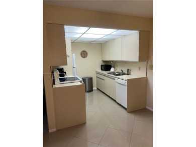 1 BEDROOM,1.1/5 BATHROOM,TILE FLOOR THROUGH OUT, NEW A/C on Wynmoor Golf Course in Florida - for sale on GolfHomes.com, golf home, golf lot