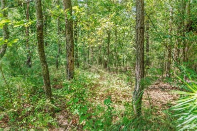Three consecutive wooded lots totaling 0.86 acres in scenic on Branchwood Golf Course in Arkansas - for sale on GolfHomes.com, golf home, golf lot