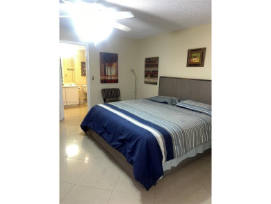 1 BEDROOM,1.1/5 BATHROOM,TILE FLOOR THROUGH OUT, NEW A/C on Wynmoor Golf Course in Florida - for sale on GolfHomes.com, golf home, golf lot