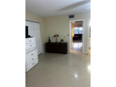 1 BEDROOM,1.1/5 BATHROOM,TILE FLOOR THROUGH OUT, NEW A/C on Wynmoor Golf Course in Florida - for sale on GolfHomes.com, golf home, golf lot