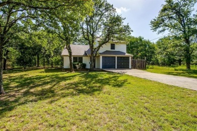 Located n the DESIRABLE White Bluff community! Home is situated on White Bluff Resort - Old Course in Texas - for sale on GolfHomes.com, golf home, golf lot