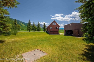 This charming Cedar log cabin is located on a scenic corner lot on Star Valley RV Golf Course in Wyoming - for sale on GolfHomes.com, golf home, golf lot