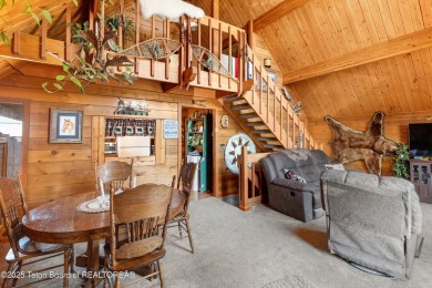This charming Cedar log cabin is located on a scenic corner lot on Star Valley RV Golf Course in Wyoming - for sale on GolfHomes.com, golf home, golf lot