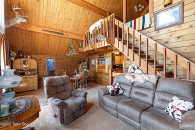 This charming Cedar log cabin is located on a scenic corner lot on Star Valley RV Golf Course in Wyoming - for sale on GolfHomes.com, golf home, golf lot
