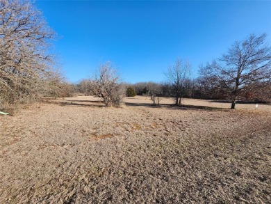 Beautiful build site right across the street from Leisure Lake on Nocona Hills Golf Course in Texas - for sale on GolfHomes.com, golf home, golf lot