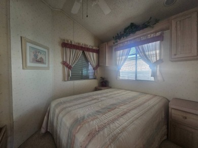 This exceptional property is not only super clean and spacious on Viewpoint Golf Resort in Arizona - for sale on GolfHomes.com, golf home, golf lot