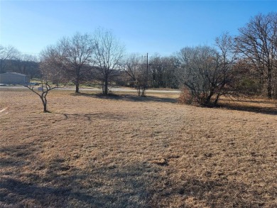 Beautiful build site right across the street from Leisure Lake on Nocona Hills Golf Course in Texas - for sale on GolfHomes.com, golf home, golf lot