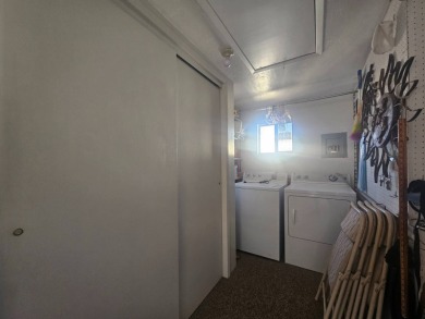 This exceptional property is not only super clean and spacious on Viewpoint Golf Resort in Arizona - for sale on GolfHomes.com, golf home, golf lot