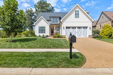 Experience refined living in this stunning modern farmhouse on Tennessee National Golf Club in Tennessee - for sale on GolfHomes.com, golf home, golf lot