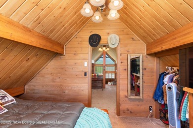 This charming Cedar log cabin is located on a scenic corner lot on Star Valley RV Golf Course in Wyoming - for sale on GolfHomes.com, golf home, golf lot