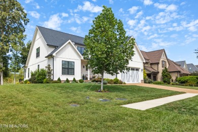 Experience refined living in this stunning modern farmhouse on Tennessee National Golf Club in Tennessee - for sale on GolfHomes.com, golf home, golf lot
