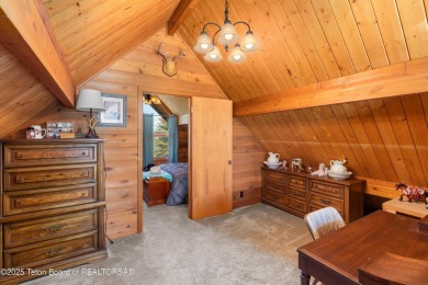 This charming Cedar log cabin is located on a scenic corner lot on Star Valley RV Golf Course in Wyoming - for sale on GolfHomes.com, golf home, golf lot