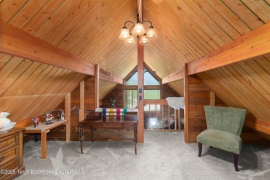 This charming Cedar log cabin is located on a scenic corner lot on Star Valley RV Golf Course in Wyoming - for sale on GolfHomes.com, golf home, golf lot