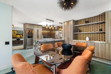 Welcome to a home where modern elegance meets timeless glamour on The Springs Country Club in California - for sale on GolfHomes.com, golf home, golf lot