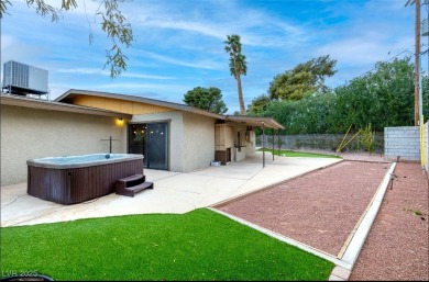 Discover this beautifully updated single-story home located on on Las Vegas National Golf Club in Nevada - for sale on GolfHomes.com, golf home, golf lot