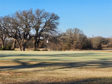 Golfers dream this beautiful build site over looking holes 1 and on Nocona Hills Golf Course in Texas - for sale on GolfHomes.com, golf home, golf lot