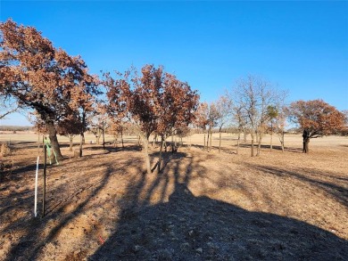 Golfers dream this beautiful build site over looking holes 1 and on Nocona Hills Golf Course in Texas - for sale on GolfHomes.com, golf home, golf lot