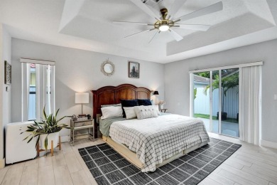 Spacious and beautifully updated 2-story home located in a on Palm-Aire Country Club and Resort - The Oaks in Florida - for sale on GolfHomes.com, golf home, golf lot