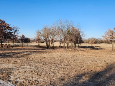 Golfers dream this beautiful build site over looking holes 1 and on Nocona Hills Golf Course in Texas - for sale on GolfHomes.com, golf home, golf lot