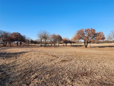 Golfers dream this beautiful build site over looking holes 1 and on Nocona Hills Golf Course in Texas - for sale on GolfHomes.com, golf home, golf lot