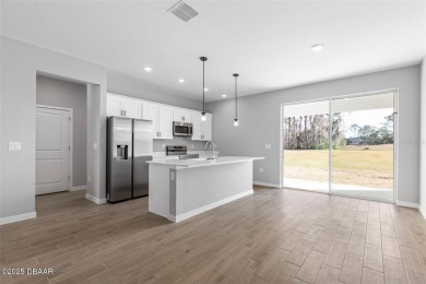 One or more photo(s) has been virtually staged. Walk to PINE on The Grand Club - Pine Lakes Course in Florida - for sale on GolfHomes.com, golf home, golf lot