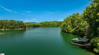 Discover an extraordinary waterfront property in The Cliffs at on The Cliffs At Keowee Falls in South Carolina - for sale on GolfHomes.com, golf home, golf lot