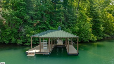 Discover an extraordinary waterfront property in The Cliffs at on The Cliffs At Keowee Falls in South Carolina - for sale on GolfHomes.com, golf home, golf lot