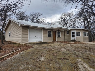 INVESTMENT!!INVESTMENT!! This home has Great bones and is ready on Nocona Hills Golf Course in Texas - for sale on GolfHomes.com, golf home, golf lot