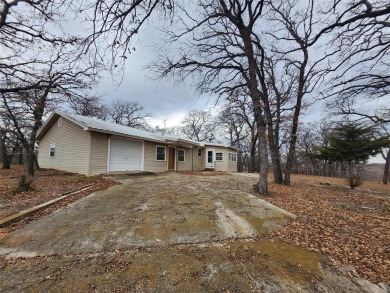 INVESTMENT!!INVESTMENT!! This home has Great bones and is ready on Nocona Hills Golf Course in Texas - for sale on GolfHomes.com, golf home, golf lot