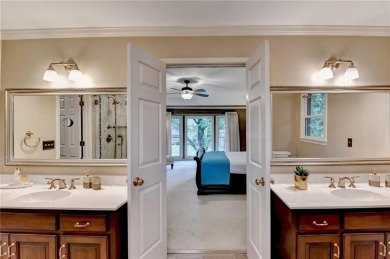 Nestled on a quiet cul-de-sac street just steps from the on Country Club of Roswell in Georgia - for sale on GolfHomes.com, golf home, golf lot