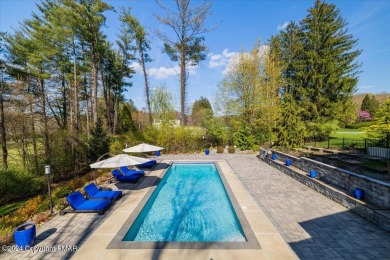 Experience the epitome of opulence in the Pocono Mountains of on Great Bear Golf and Country Club in Pennsylvania - for sale on GolfHomes.com, golf home, golf lot
