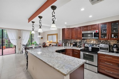 Discover this impeccably maintained townhome nestled in one of on Costa Greens Golf Club in Florida - for sale on GolfHomes.com, golf home, golf lot