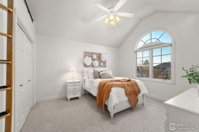 This custom-built home offers stunning lake views throughout the on Pelican Lakes Golf and Country Club in Colorado - for sale on GolfHomes.com, golf home, golf lot