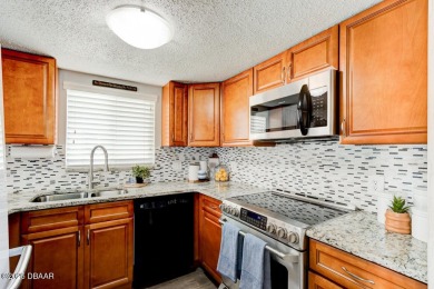 Don't miss out on this beautifully updated 3-bedroom, 2-bath on Oceanside Country Club in Florida - for sale on GolfHomes.com, golf home, golf lot