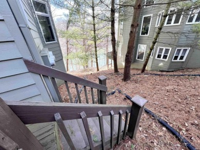 Nestled along the tranquil shores of Lake Monroe, this charming for sale on GolfHomes.com